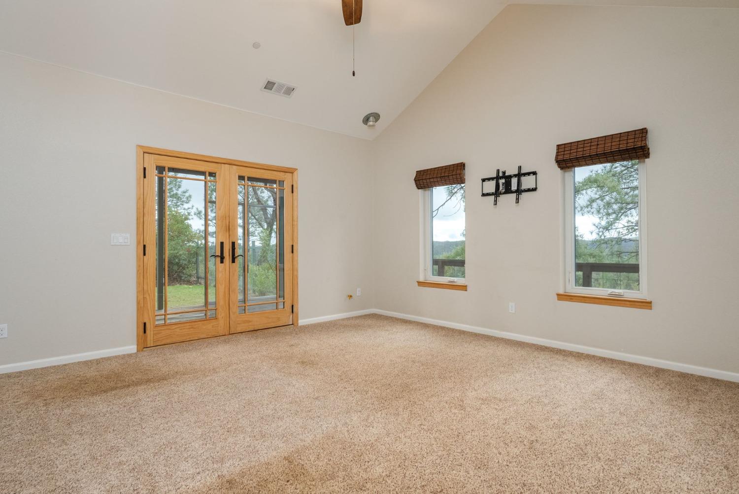 9080 El Dorado Trail Mountain Ranch, CA 95246 - Photo 22 of 44 a view of an empty room with a window