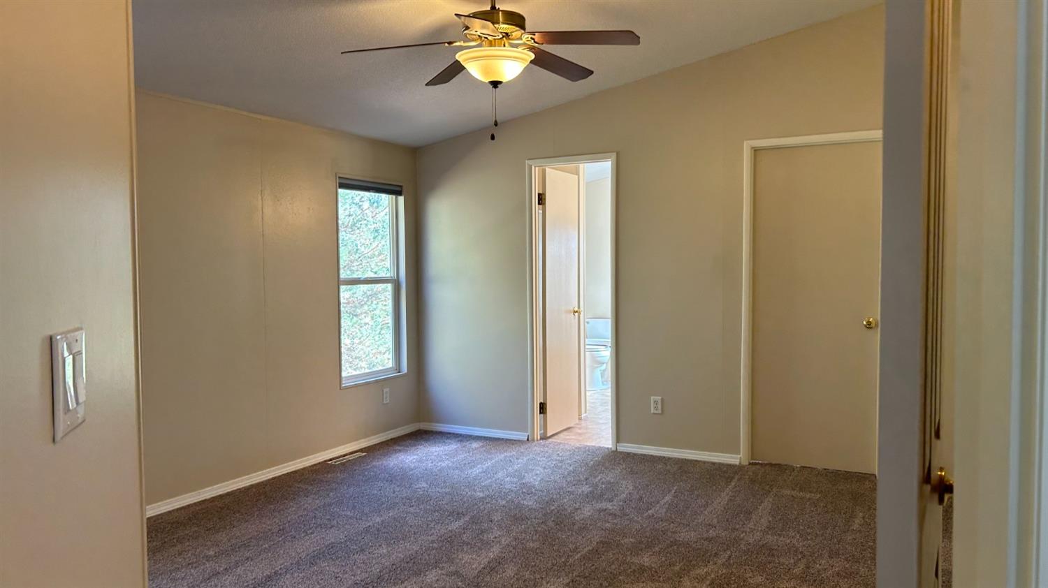 9080 El Dorado Trail Mountain Ranch, CA 95246 - Photo 38 of 44 a view of an empty room with a window