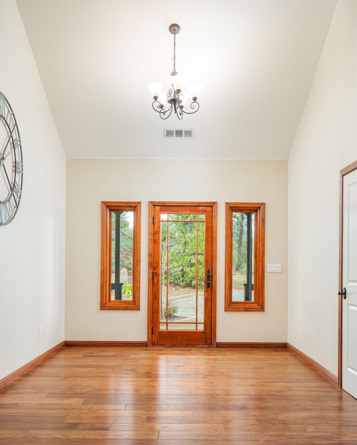9080 El Dorado Trail Mountain Ranch, CA 95246 - Photo 10 of 44 a view of an empty room with a window