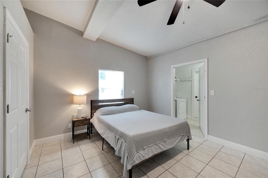 3651 Haines Road North St. Petersburg, FL 33704 - Photo 27 of 35 a bedroom with a bed and a window