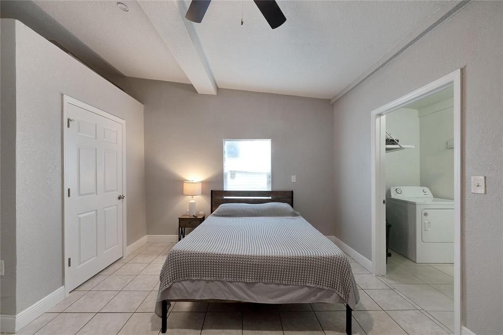 3651 Haines Road North St. Petersburg, FL 33704 - Photo 28 of 35 a bedroom with a bed and a window