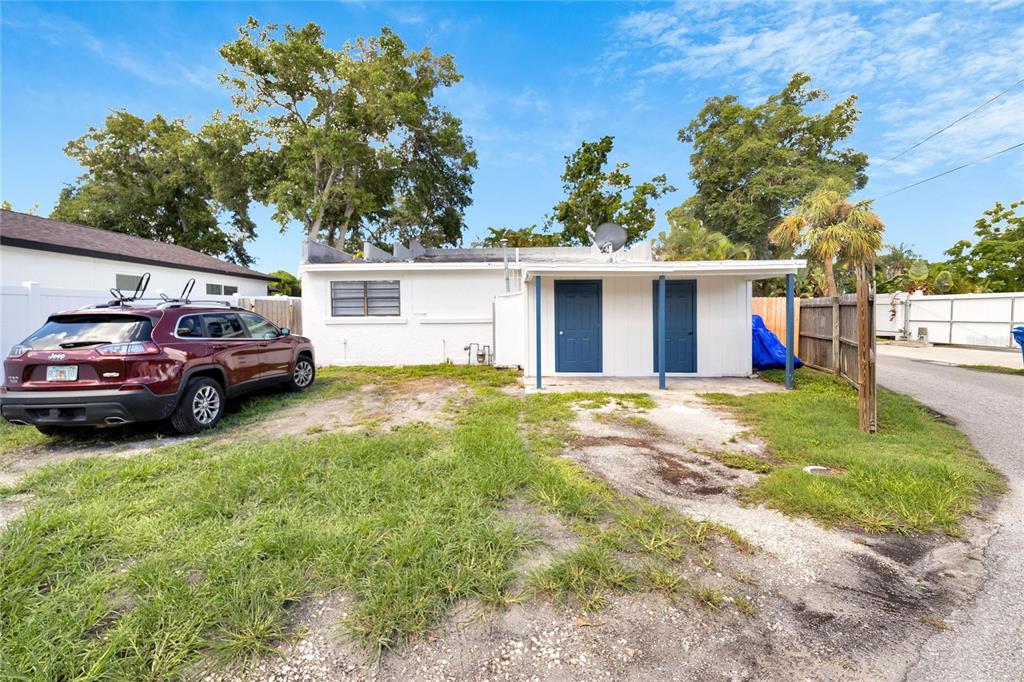 3651 Haines Road North St. Petersburg, FL 33704 - Photo 10 of 35 a front view of a house with garden