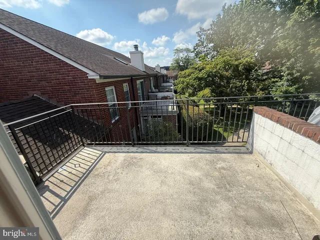 a view of front of a house with windows