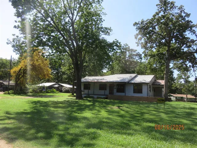 a view of a house with a swimming pool