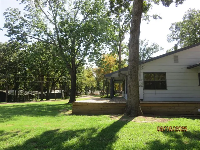 a view of a park with tree s