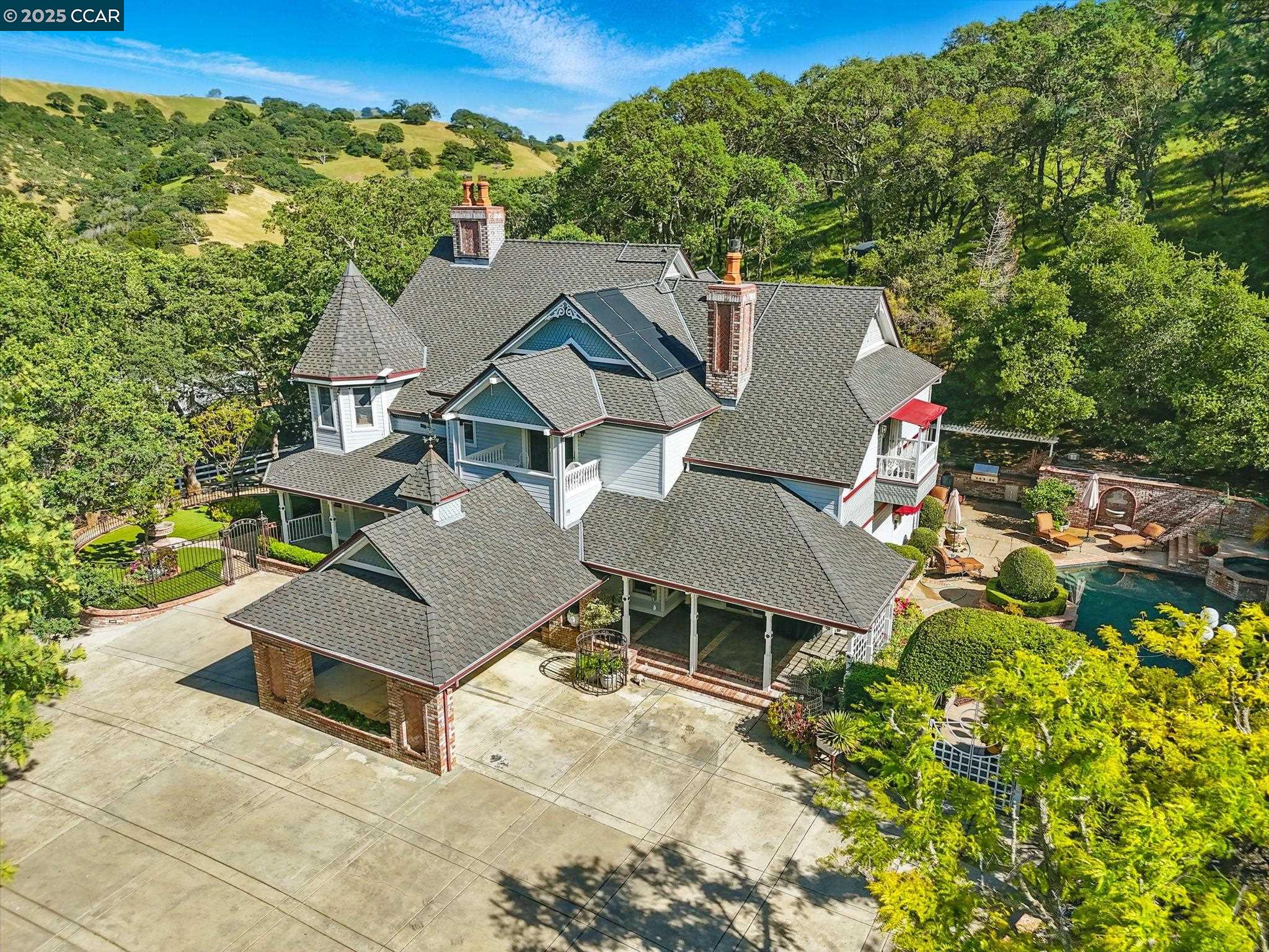 1980 Curry Canyon Road Clayton, CA 94517 - Photo 1 of 1 an aerial view of a house with a yard