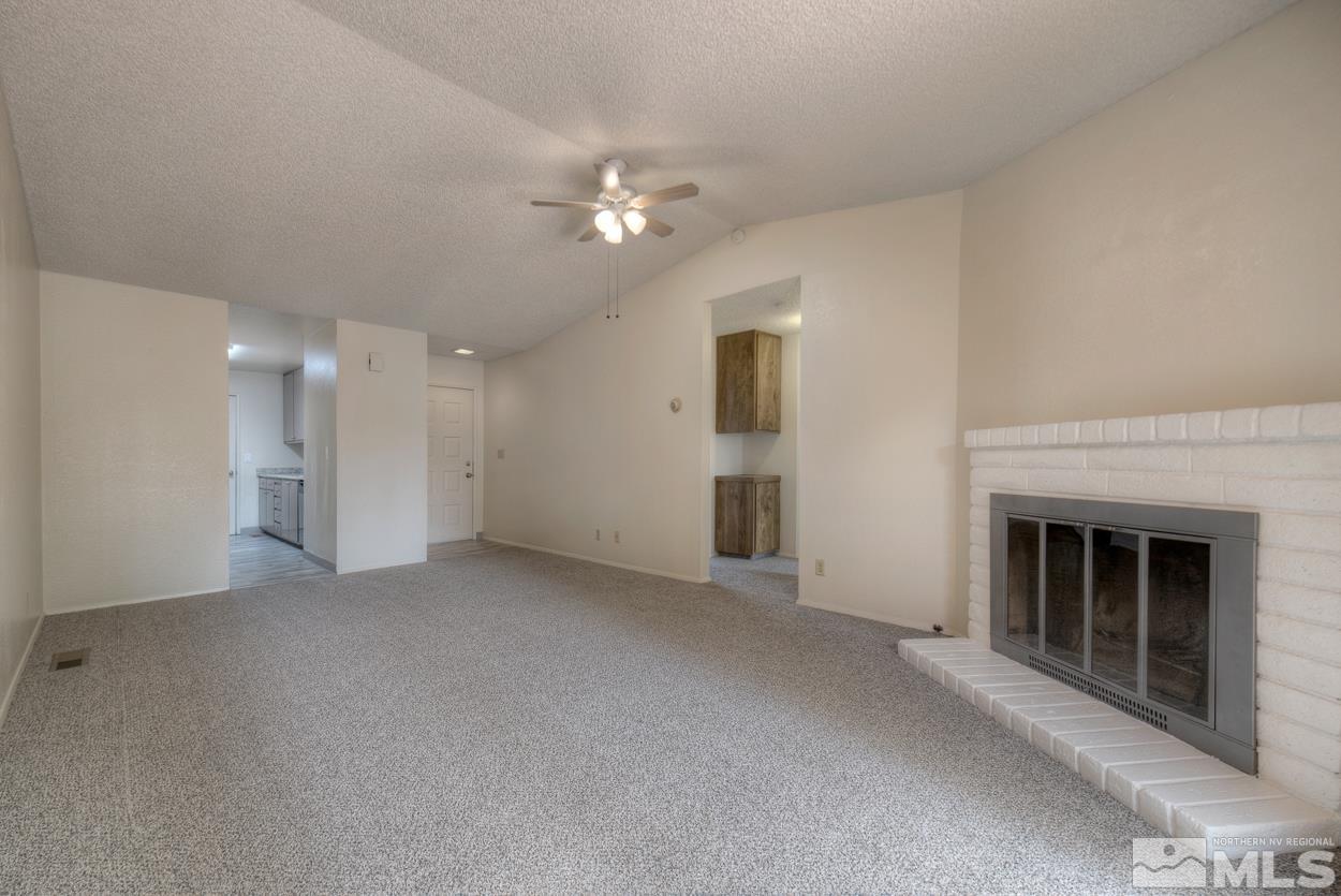 10034 Humite Lane Reno, NV 89506 - Photo 10 of 21 a view of a livingroom with an empty space