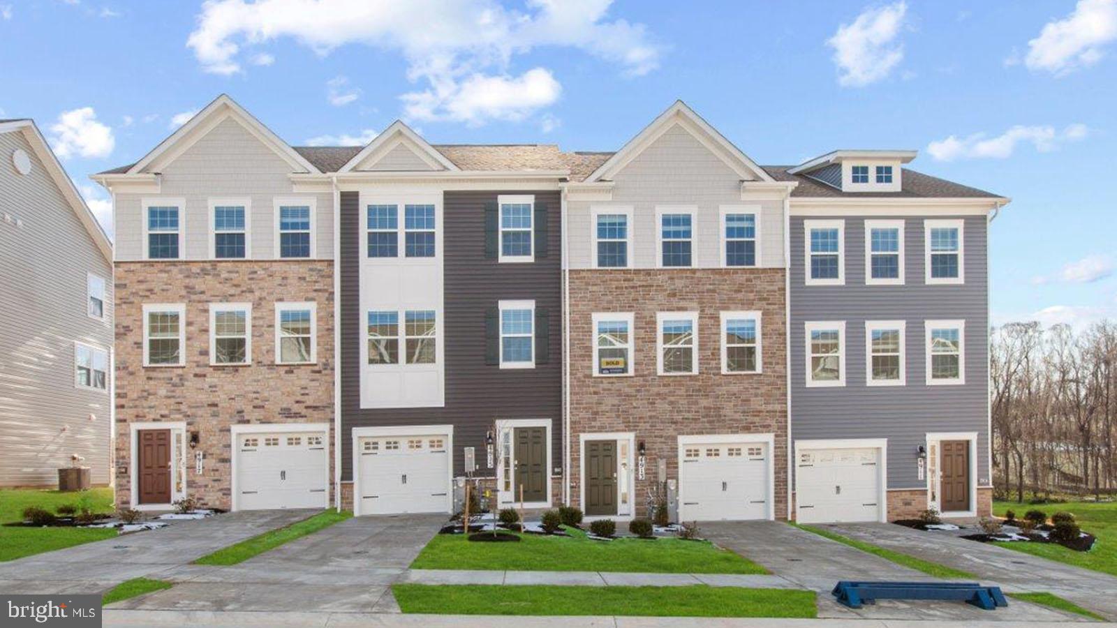 5019 Silver Oak Drive Rosedale, MD 21237 - Photo 2 of 43 a front view of a house with a yard