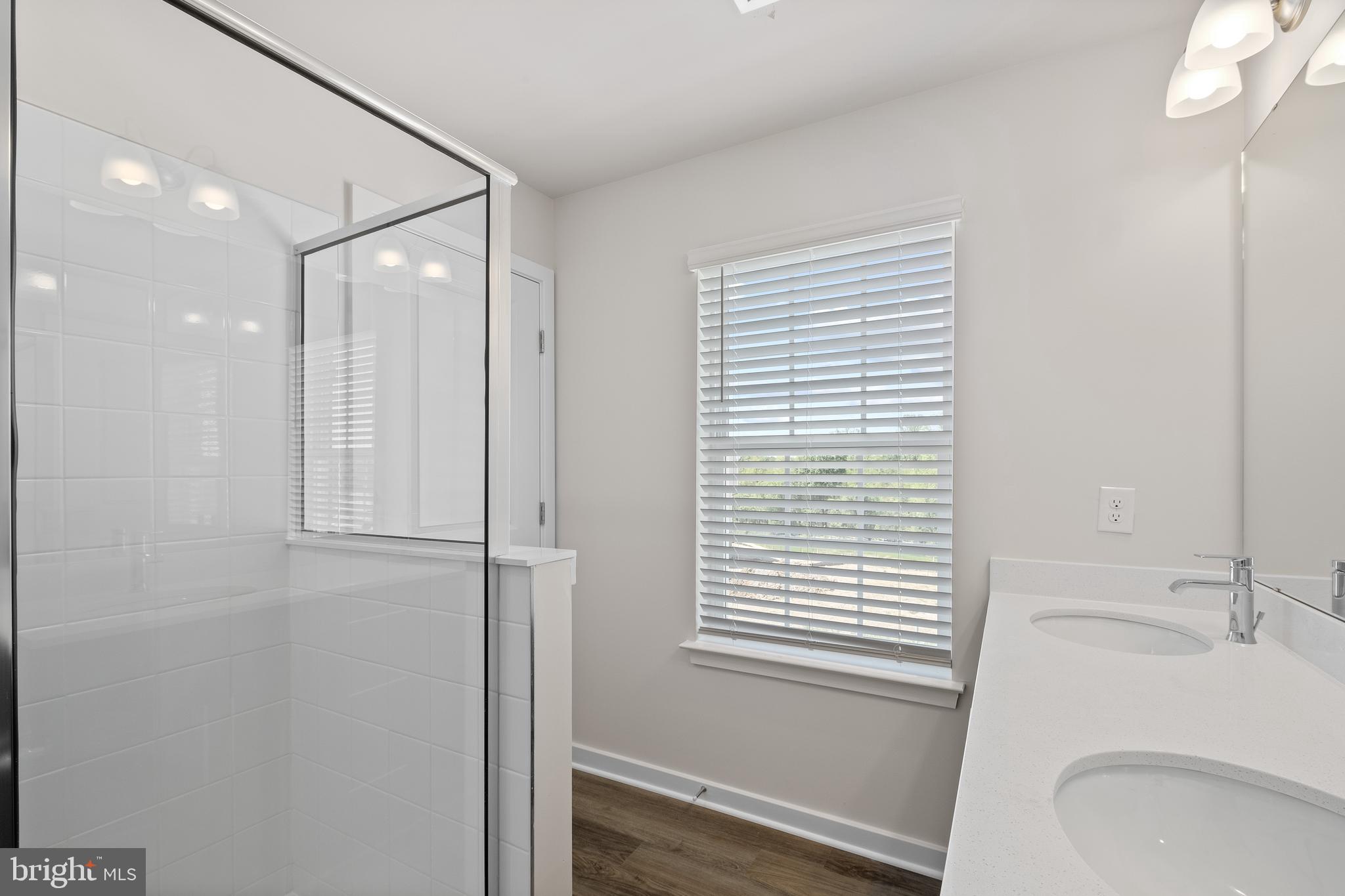 5019 Silver Oak Drive Rosedale, MD 21237 - Photo 32 of 43 a bathroom with a sink a toilet and shower