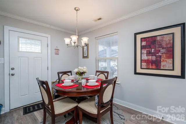 a view of a house with a street