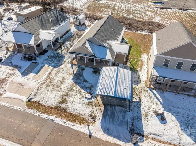 a view of front door with chair and table