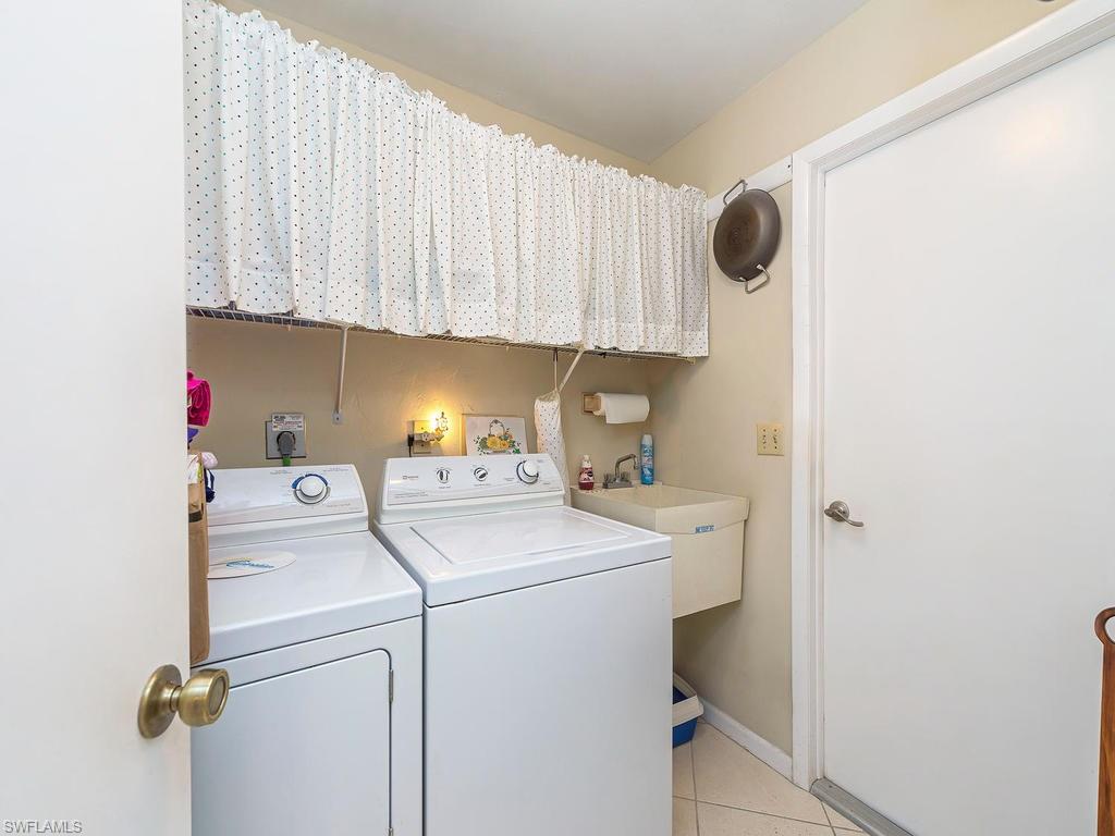 121 Blue Ridge Drive Naples, FL 34112 - Photo 12 of 14 Laundry room off the garage