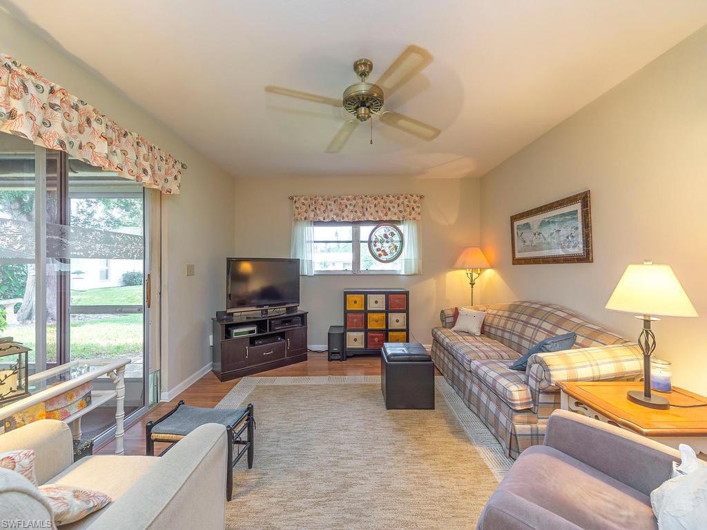 Family room with sliders onto screened lanai