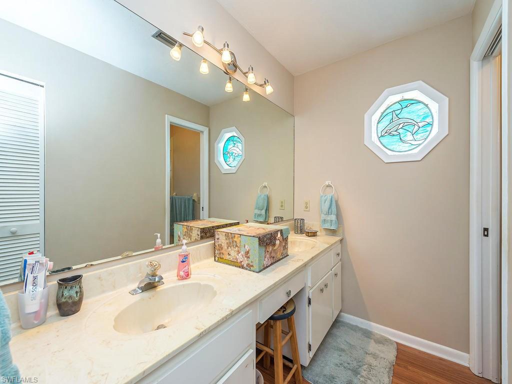 121 Blue Ridge Drive Naples, FL 34112 - Photo 8 of 14 Master bathroom has a walk-in closet