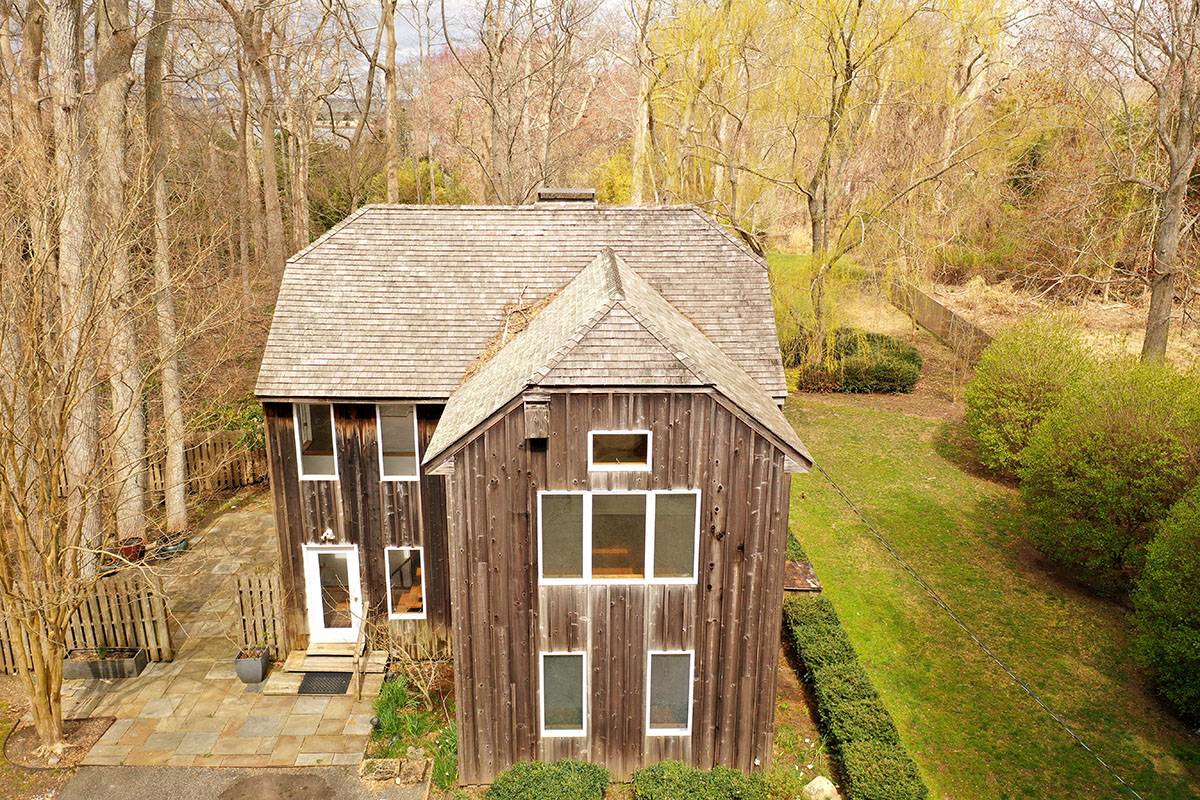 2855 Noyack Road Sag Harbor, NY 11963 - Photo 12 of 13 a view of a house with backyard