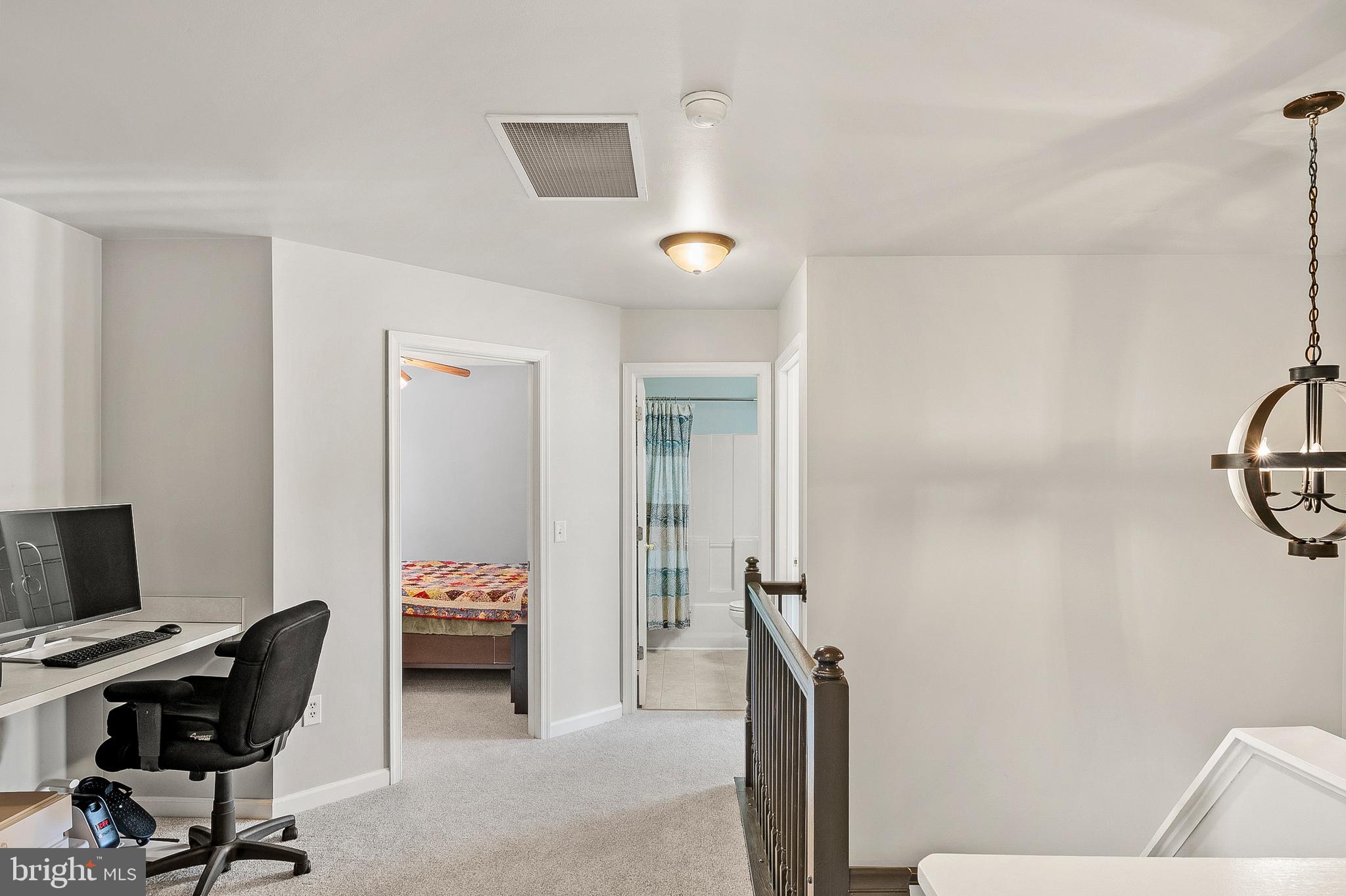 716 Wagner Farm Road Millersville, MD 21108 - Photo 21 of 45 a bedroom with a workspace