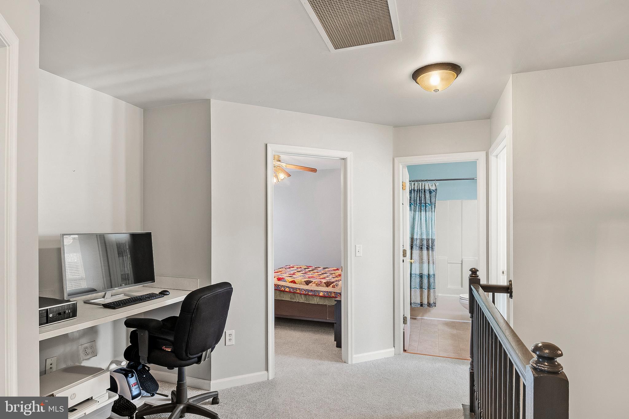 716 Wagner Farm Road Millersville, MD 21108 - Photo 22 of 45 a bedroom with a workspace