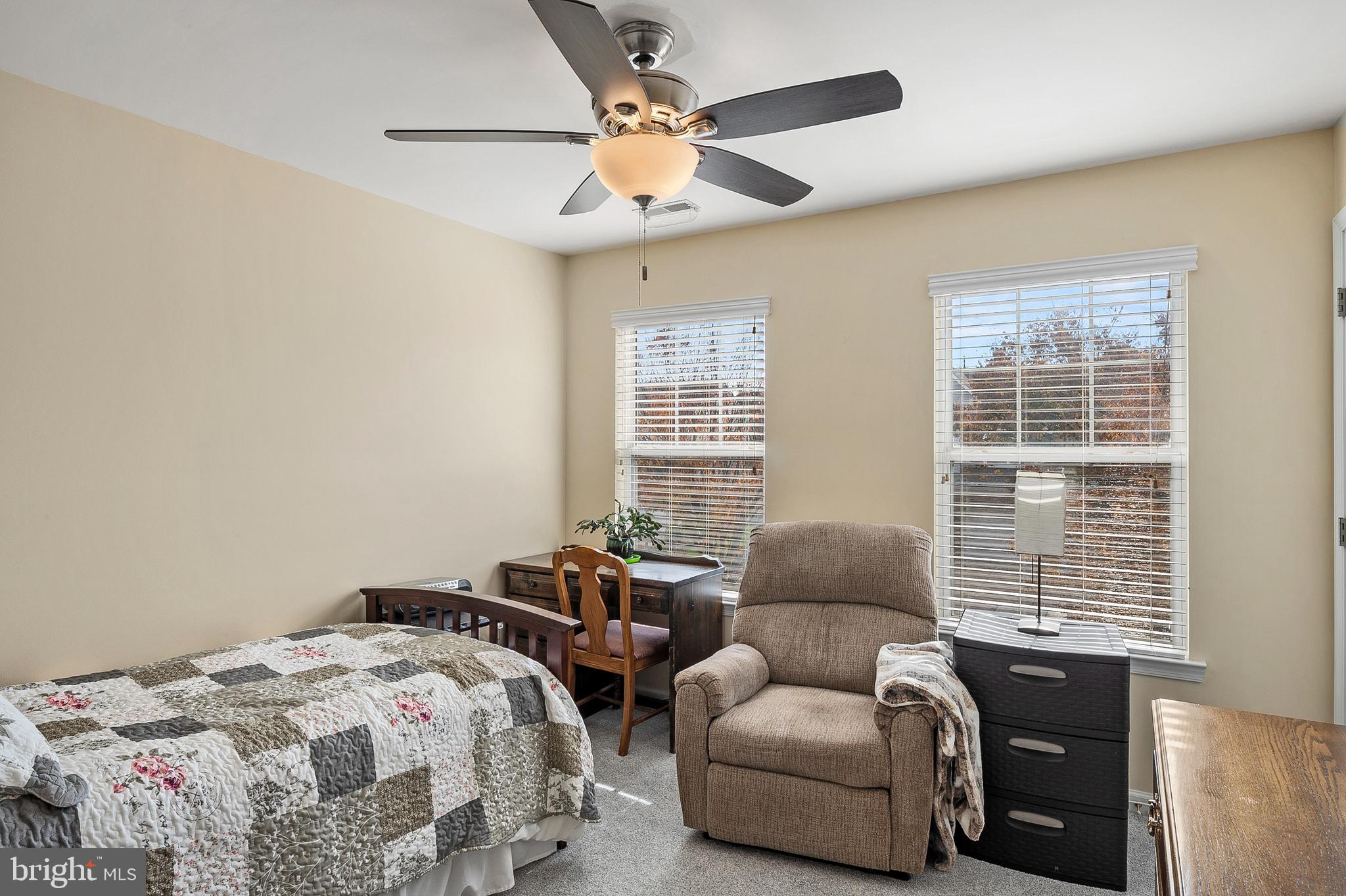 716 Wagner Farm Road Millersville, MD 21108 - Photo 30 of 45 a bedroom with bed couch and window