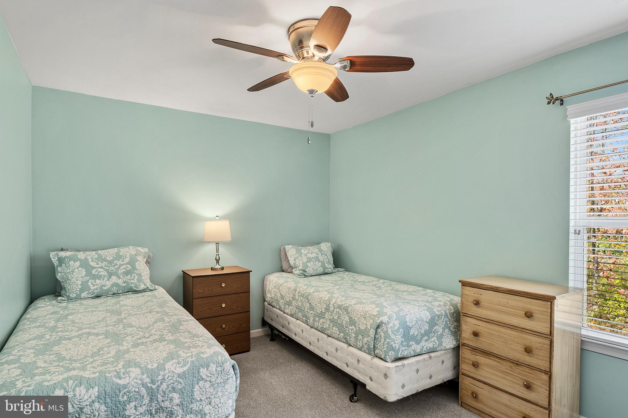 716 Wagner Farm Road Millersville, MD 21108 - Photo 34 of 45 a bedroom with two beds and painting on the wall