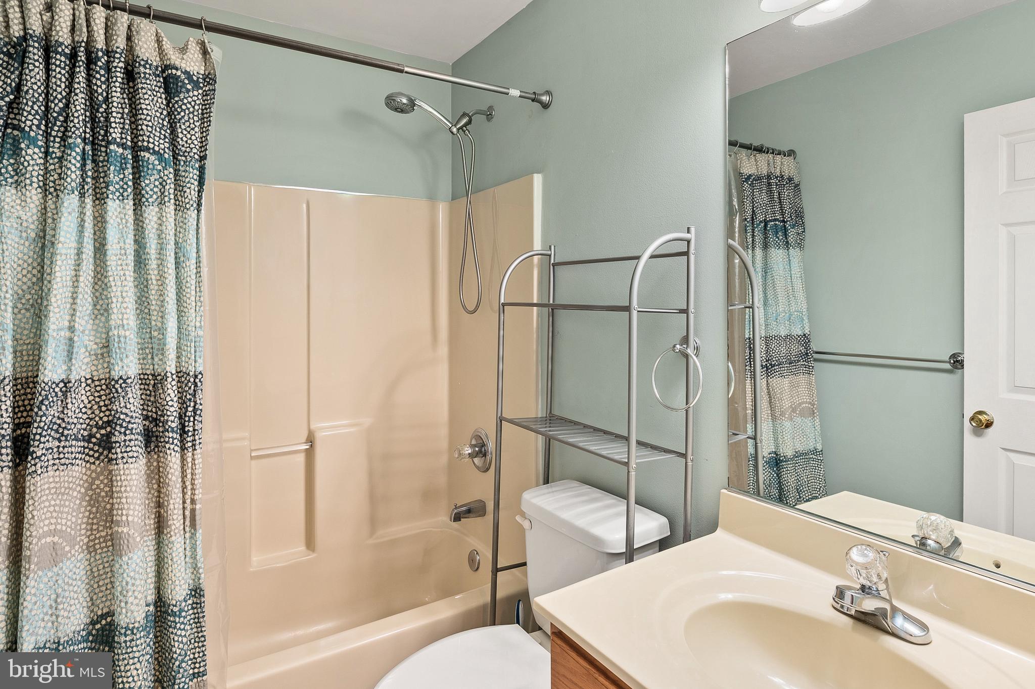 716 Wagner Farm Road Millersville, MD 21108 - Photo 35 of 45 a bathroom with a sink toilet and shower