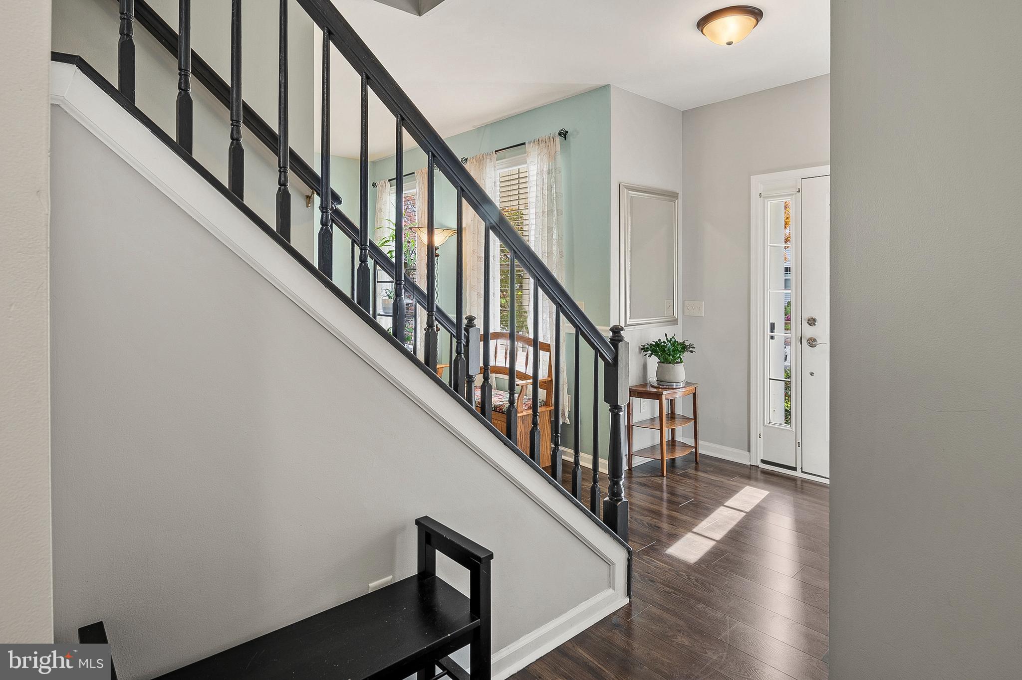 716 Wagner Farm Road Millersville, MD 21108 - Photo 6 of 45 a view of staircase with wooden floor and white walls