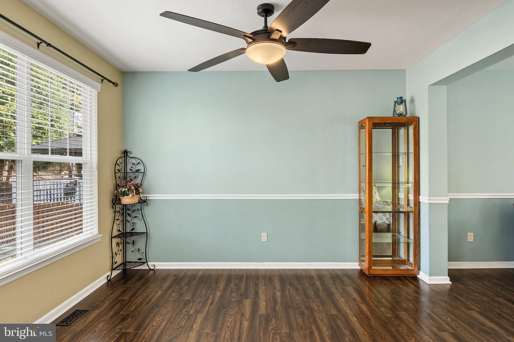 716 Wagner Farm Road Millersville, MD 21108 - Photo 10 of 45 wooden floor in an empty room with a window