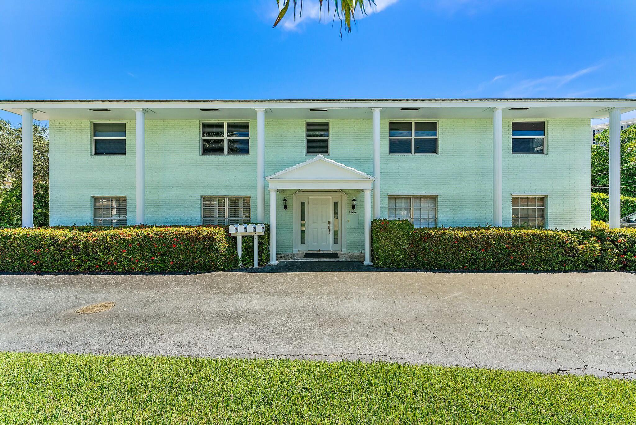 3036 Park Avenue Riviera Beach, FL 33404 - Photo 21 of 22 a front view of a house with yard and mountain view