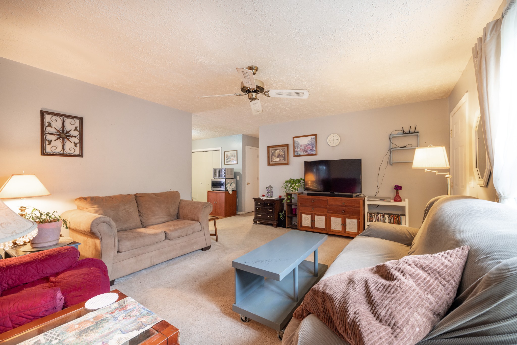 5622 Hopewell Road Springfield, TN 37172 - Photo 14 of 23 a living room with furniture and a flat screen tv