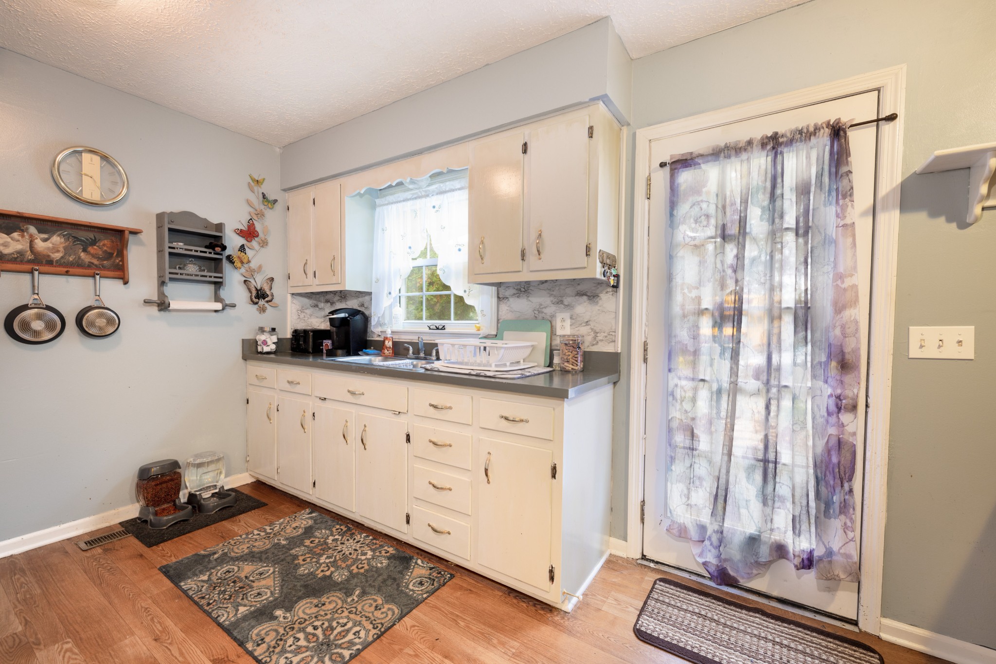 5622 Hopewell Road Springfield, TN 37172 - Photo 9 of 23 a kitchen with stainless steel appliances granite countertop a refrigerator and a stove top oven