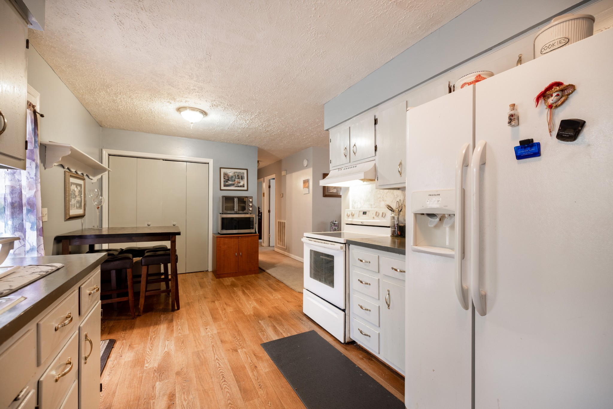5622 Hopewell Road Springfield, TN 37172 - Photo 10 of 23 a kitchen with stainless steel appliances a refrigerator and a stove top oven