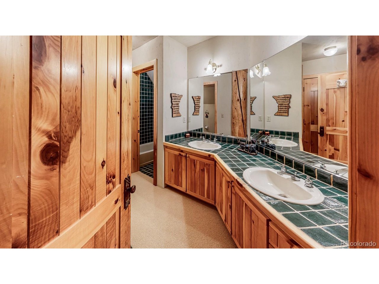 2418 Forest Road Creede, CO 81130 - Photo 20 of 50 a bathroom with a sink double vanity