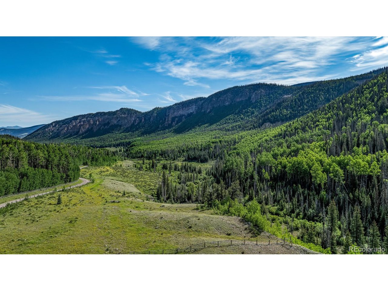 2418 Forest Road Creede, CO 81130 - Photo 23 of 50 a open area with mountains in the background
