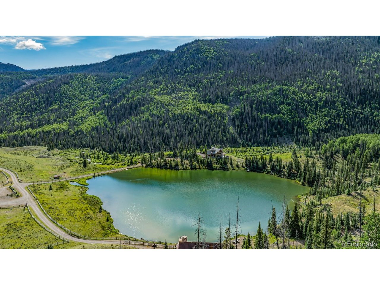 2418 Forest Road Creede, CO 81130 - Photo 24 of 50 a black and white photo of a lake