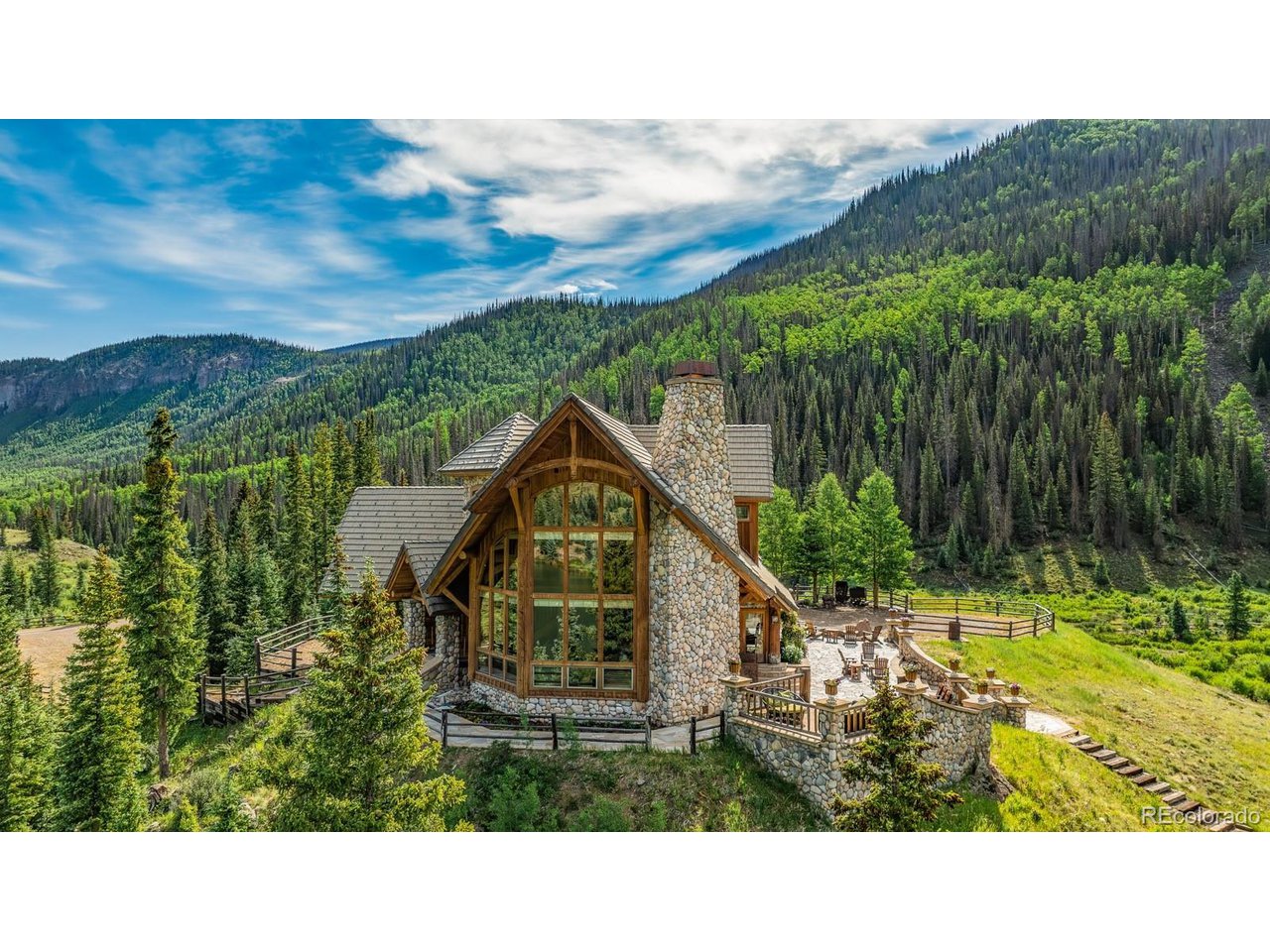 2418 Forest Road Creede, CO 81130 - Photo 35 of 50 a view of a house with a yard