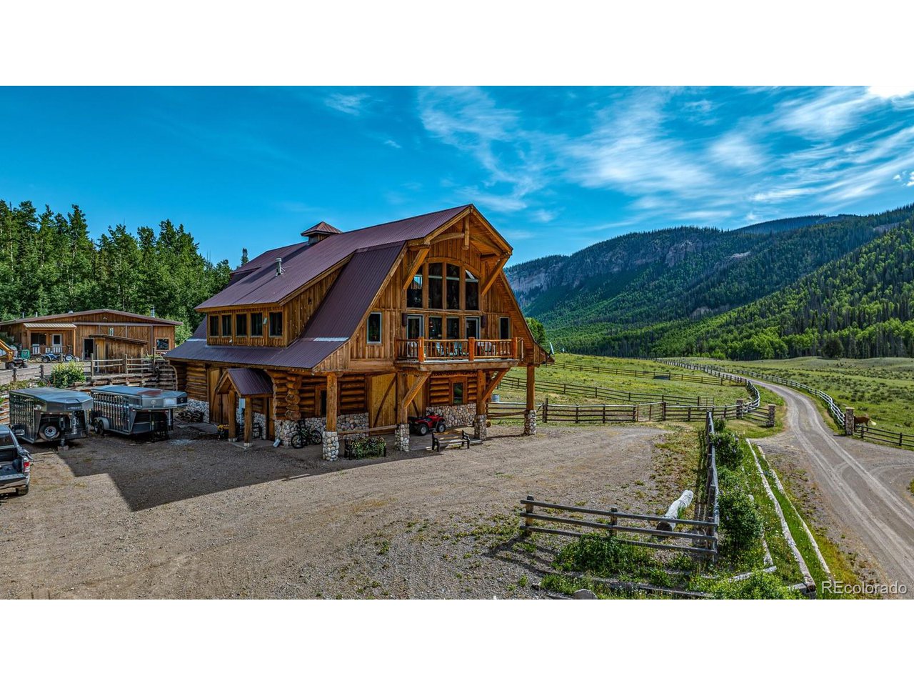 2418 Forest Road Creede, CO 81130 - Photo 44 of 50 a view of multiple houses with a yard