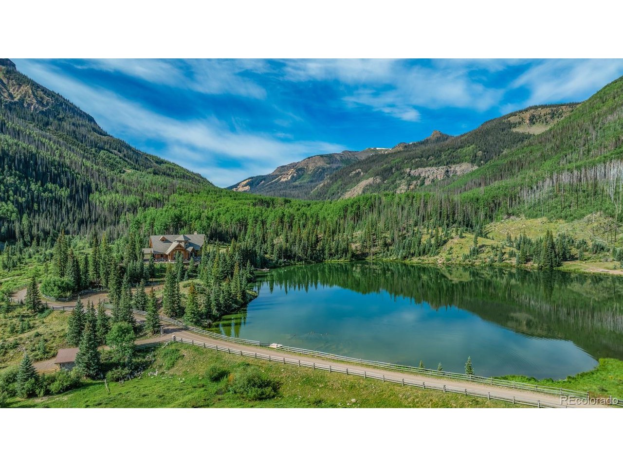 2418 Forest Road Creede, CO 81130 - Photo 50 of 50 a view of a lake with a mountain in the background