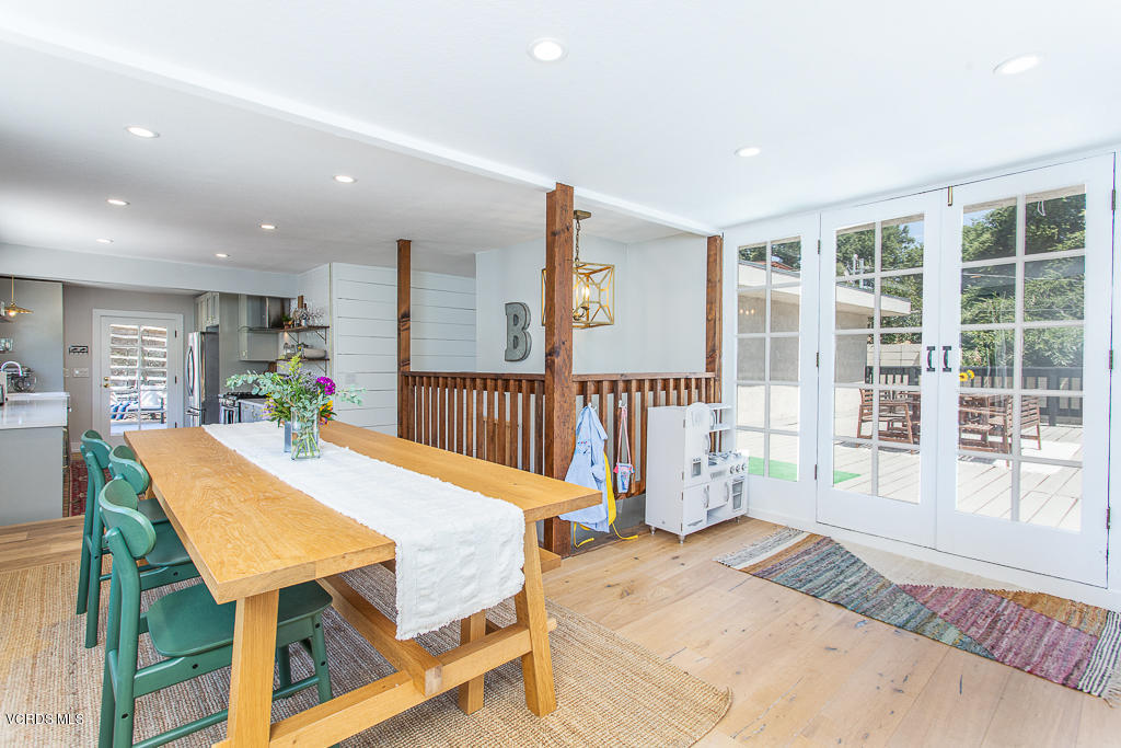 993 Katherine Road Simi Valley, CA 93063 - Photo 12 of 44 a dining room with furniture and a floor to ceiling window