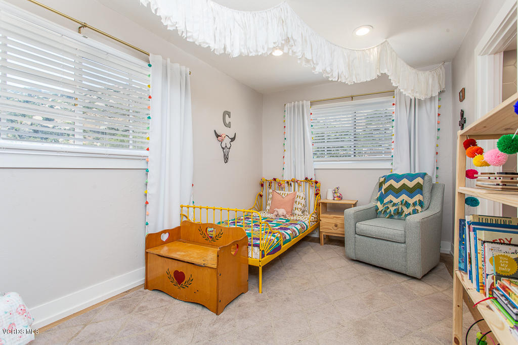993 Katherine Road Simi Valley, CA 93063 - Photo 21 of 44 a bedroom with furniture and a window