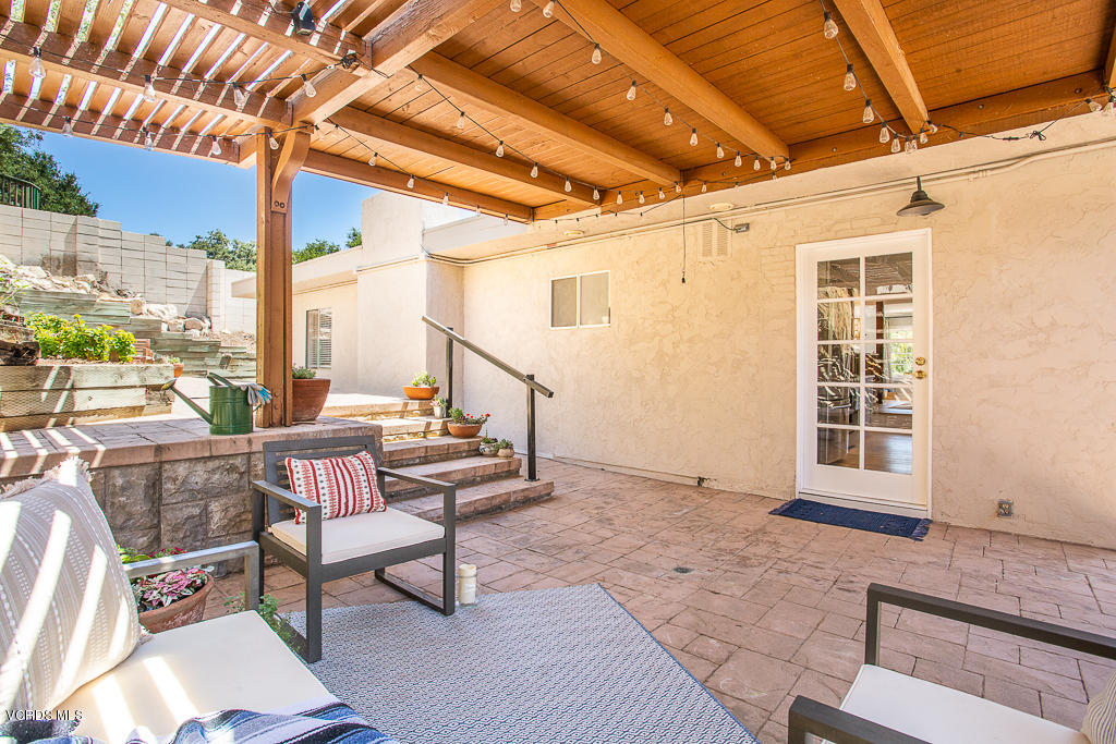 993 Katherine Road Simi Valley, CA 93063 - Photo 27 of 44 a view of a chairs and table in the patio