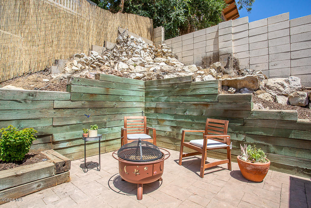 993 Katherine Road Simi Valley, CA 93063 - Photo 29 of 44 a backyard of a house with outdoor seating