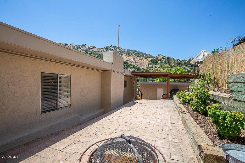 993 Katherine Road Simi Valley, CA 93063 - Photo 30 of 44 a front view of a house with a yard