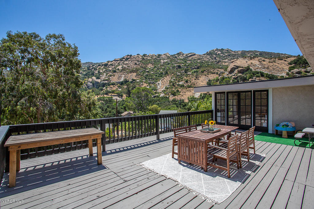 993 Katherine Road Simi Valley, CA 93063 - Photo 32 of 44 a view of a roof deck with couches and wooden floor
