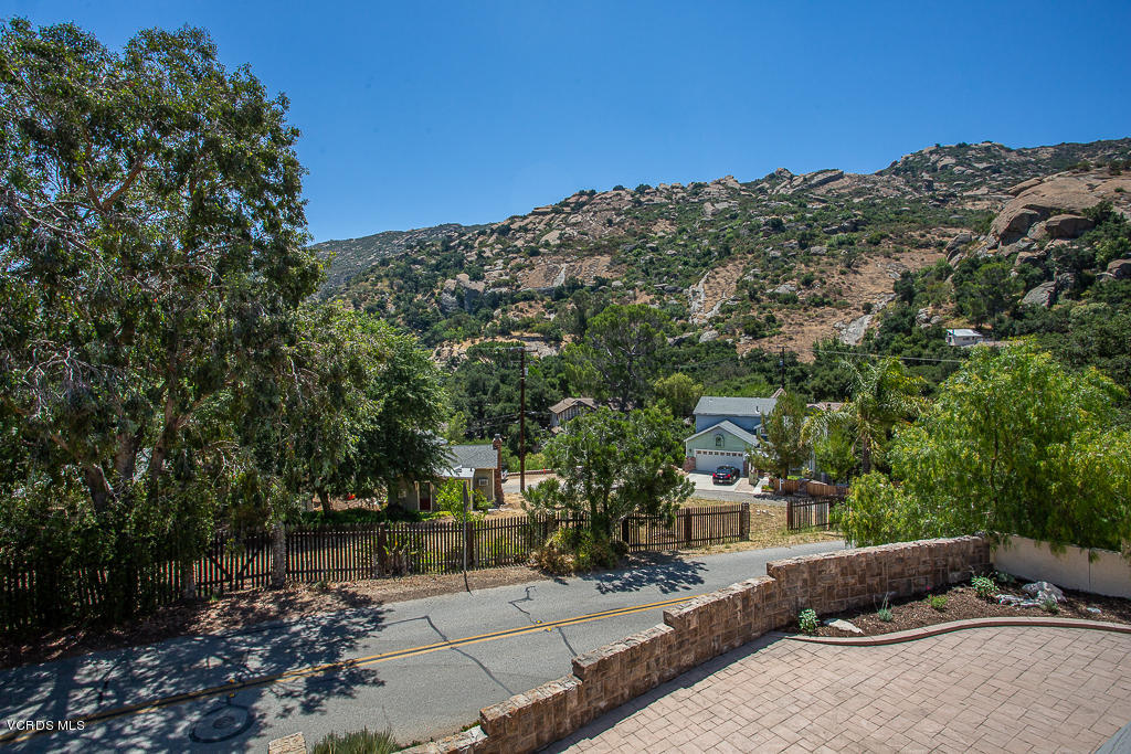 993 Katherine Road Simi Valley, CA 93063 - Photo 37 of 44 a view of a street with a building in the background