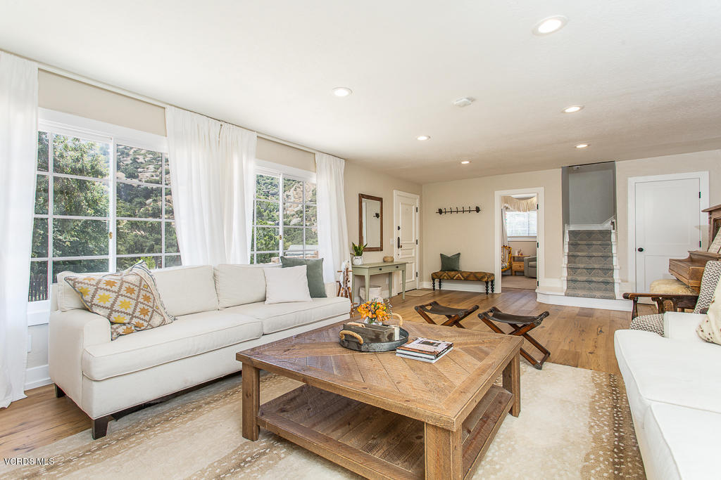 993 Katherine Road Simi Valley, CA 93063 - Photo 7 of 44 a living room with furniture and a large window