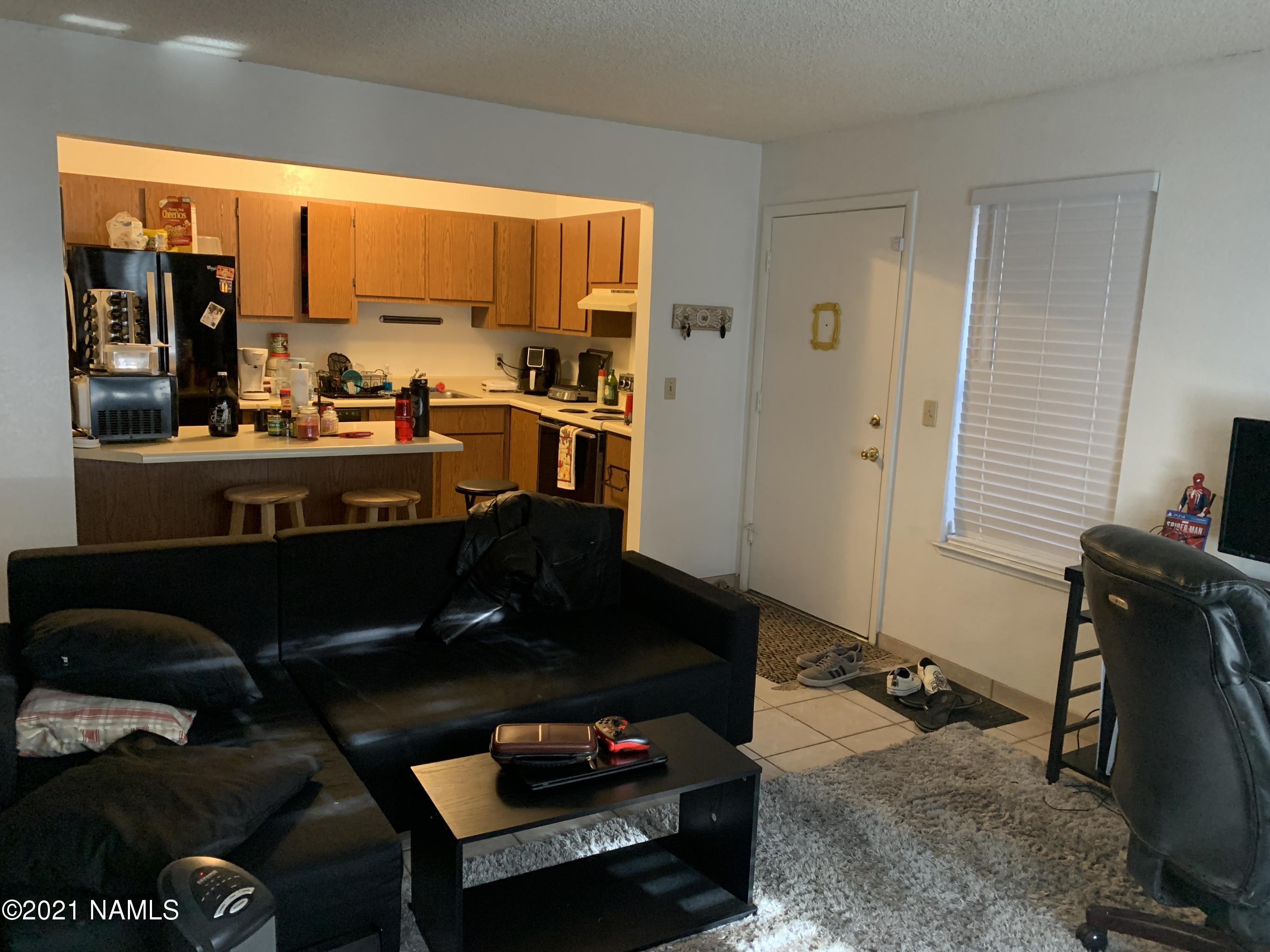 1200 South Riordan Ranch Street, Unit 103 Flagstaff, AZ 86001 - Photo 2 of 5 Living Room 2