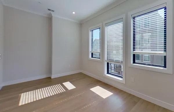 an empty room with windows