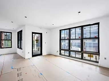 a view of an empty room with window