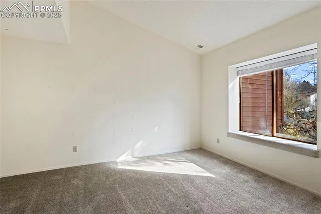 a view of empty room with window