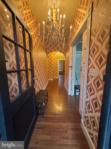 a view of entryway with wooden floor