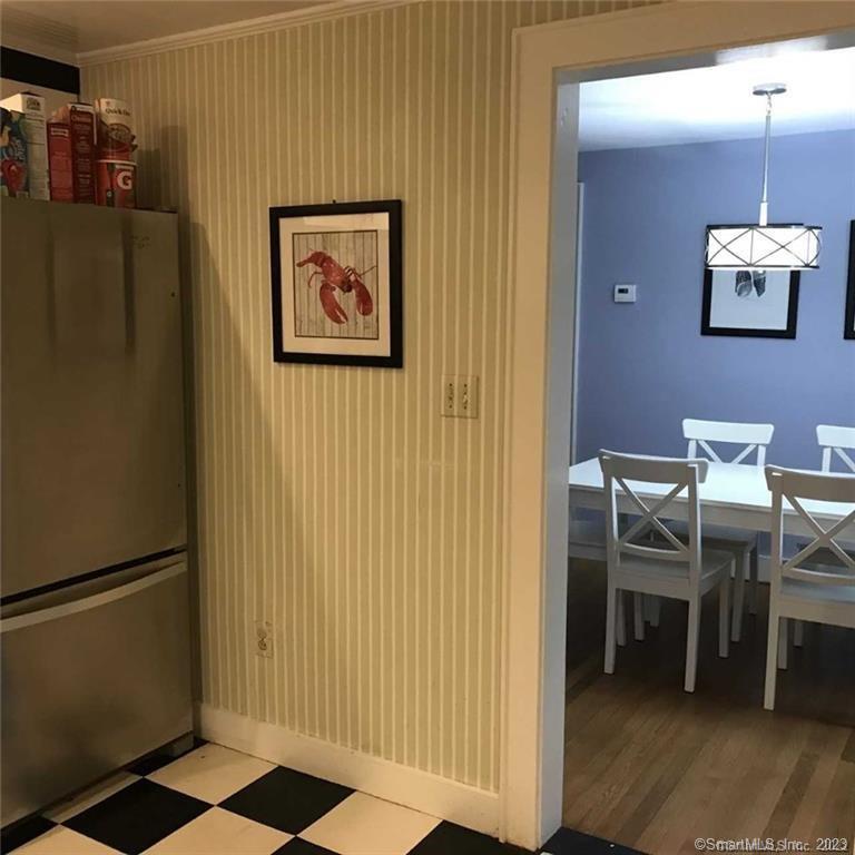 39 Masons Island Road Stonington, CT 06355 - Photo 8 of 16 a view of a hallway with elevator